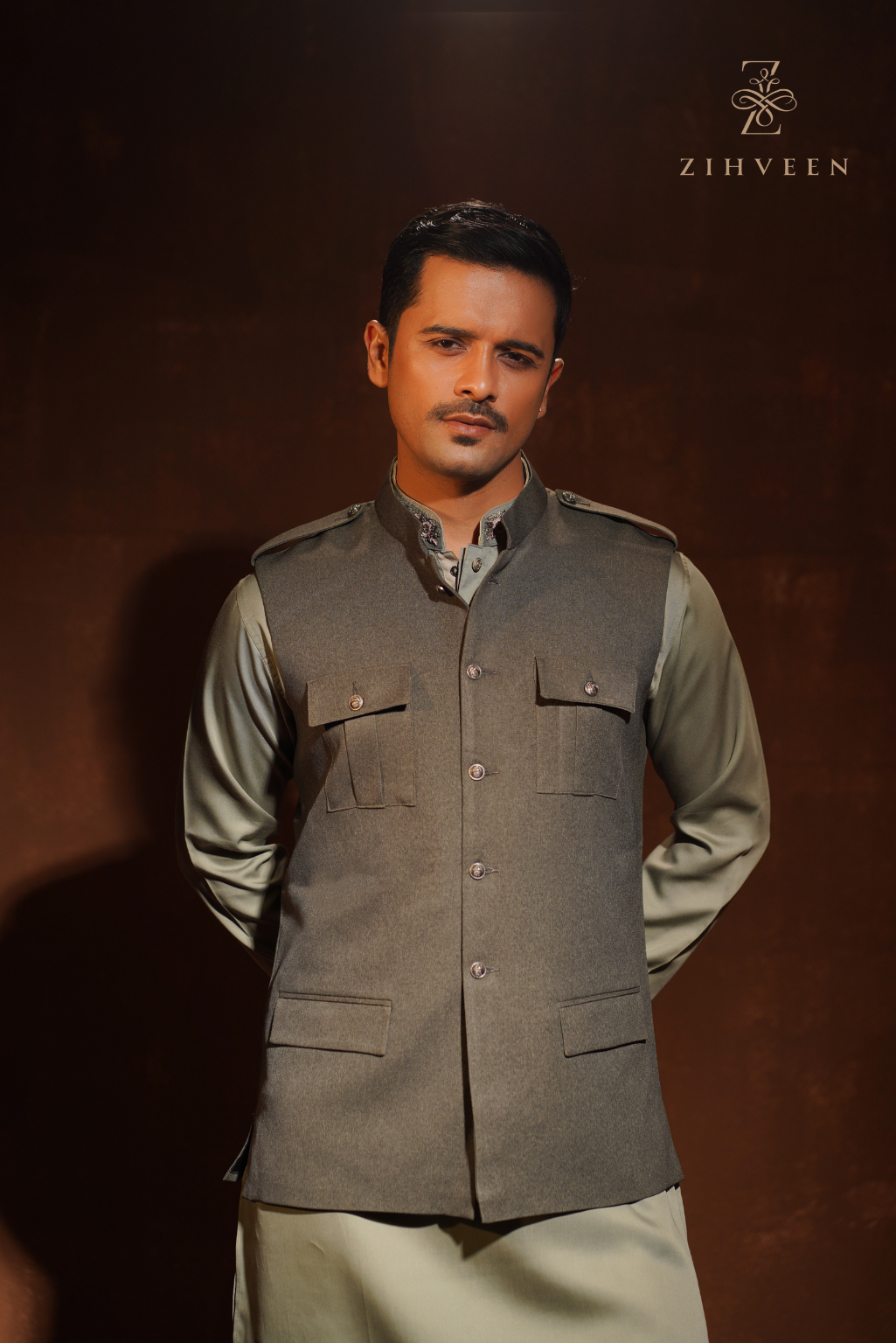 Olive Haze vest with shoulder loop and elegant button